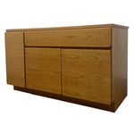 Load image into Gallery viewer, Wooden sideboard with three doors on a white background
