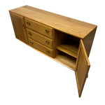 Load image into Gallery viewer, Wooden sideboard with open door on a white background
