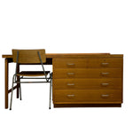 Load image into Gallery viewer, Wooden desk with drawers and a chair on a white background
