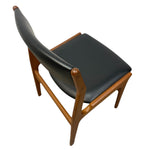 Load image into Gallery viewer, Chair with black cushioned seat and backrest on a white background

