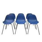 Load image into Gallery viewer, Set of six blue chairs with black legs on a white background
