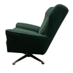 Load image into Gallery viewer, Green armchair with a swivel base on a white background
