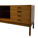 Load image into Gallery viewer, Wooden dresser with multiple drawers on a white background
