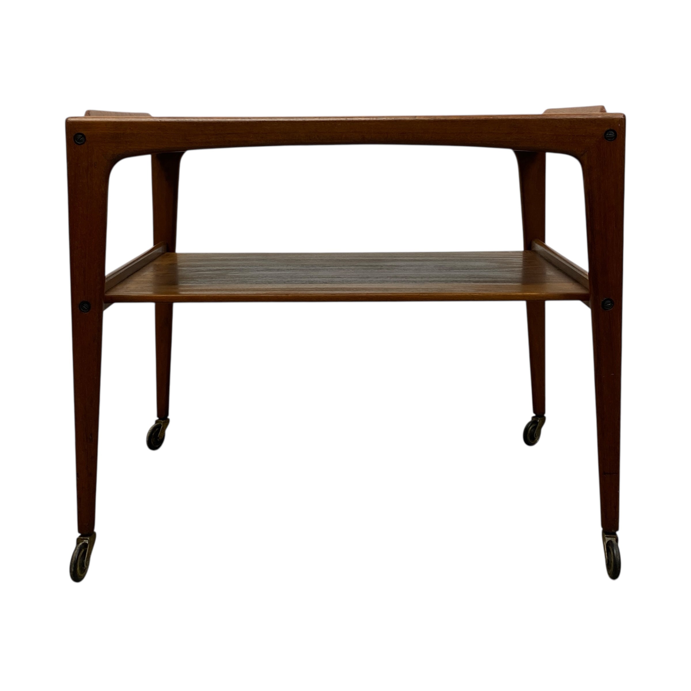 Wooden side table with wheels on a white background