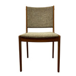 Load image into Gallery viewer, Wooden chair with woven backrest and seat on a white background
