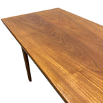 Load image into Gallery viewer, Wooden table with a visible grain pattern on a white background

