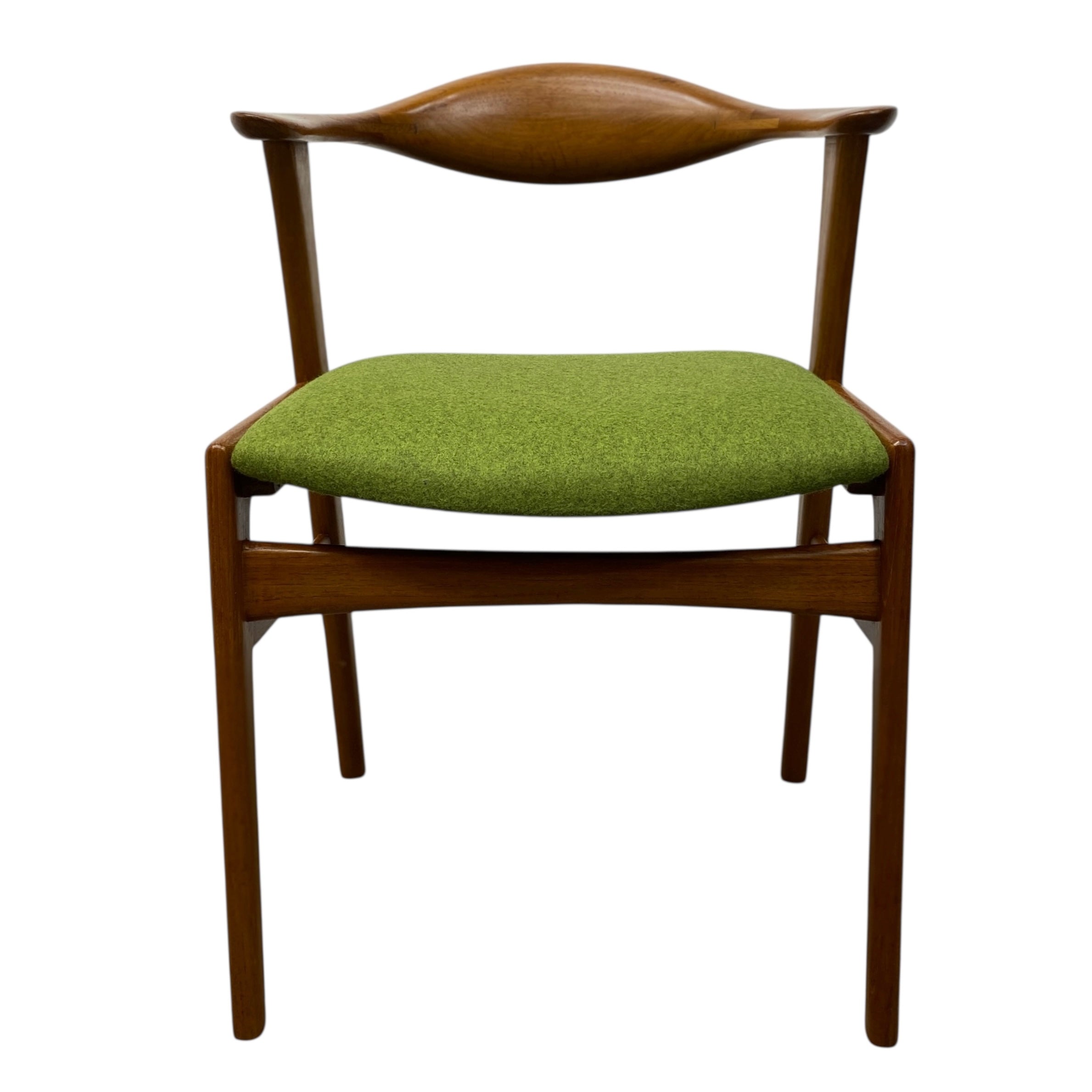 Chair with wooden frame and green cushion on a white background