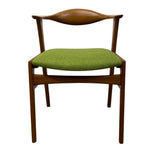 Load image into Gallery viewer, Chair with wooden frame and green cushion on a white background
