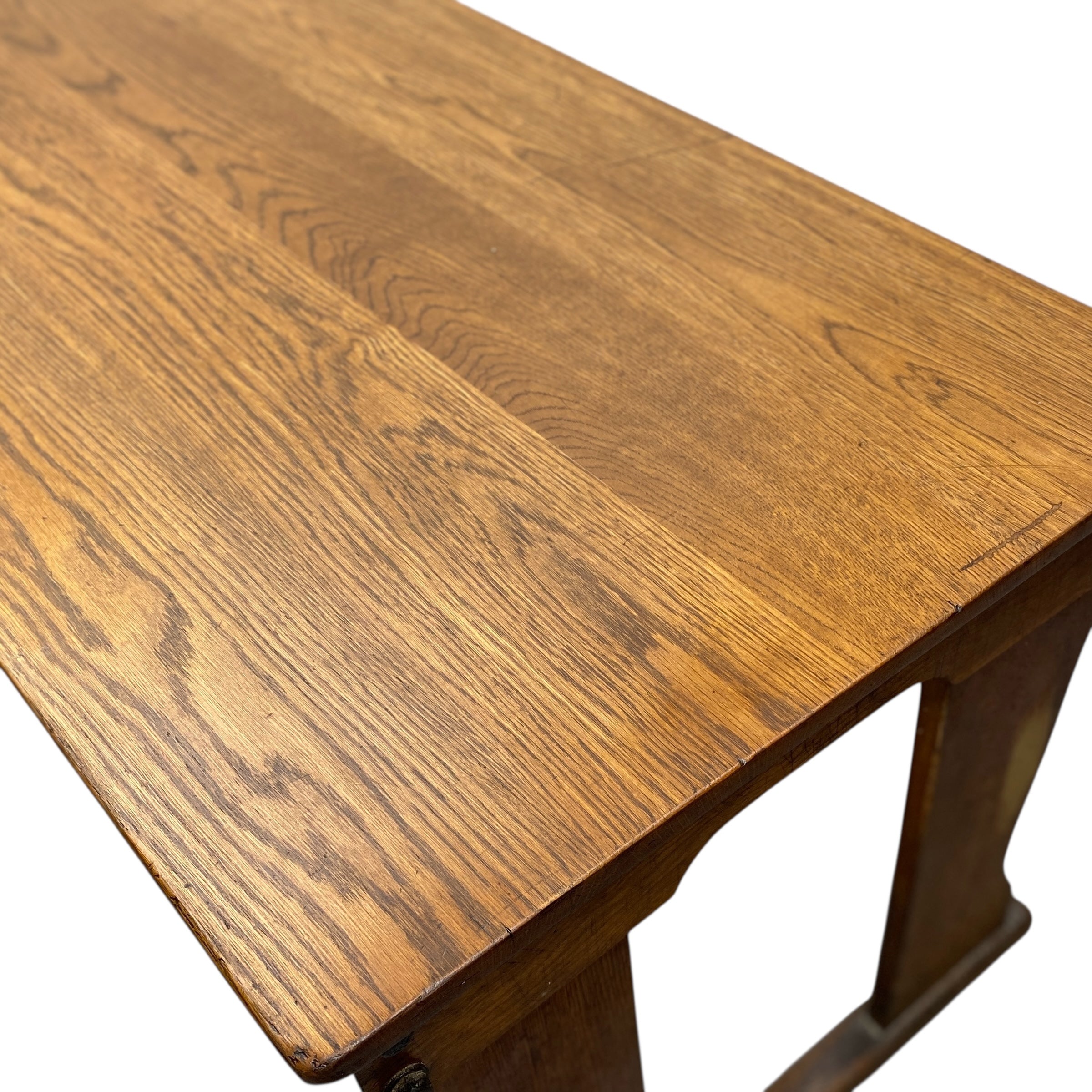 Wooden table with a visible grain pattern on a white background