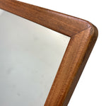 Load image into Gallery viewer, Close-up of a wooden mirror frame corner on a white background
