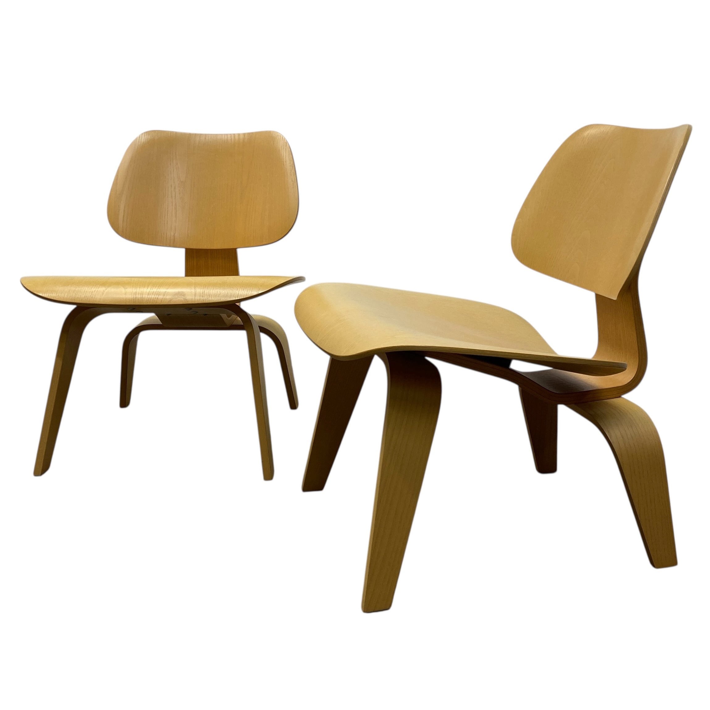 Two wooden chairs on a white background