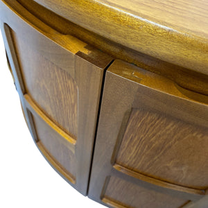 Close-up of a wooden barrel with metal hoops on a white background