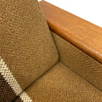 Load image into Gallery viewer, Close-up of brown textured fabric and wooden armrest
