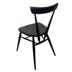 Load image into Gallery viewer, Black chair on a white background
