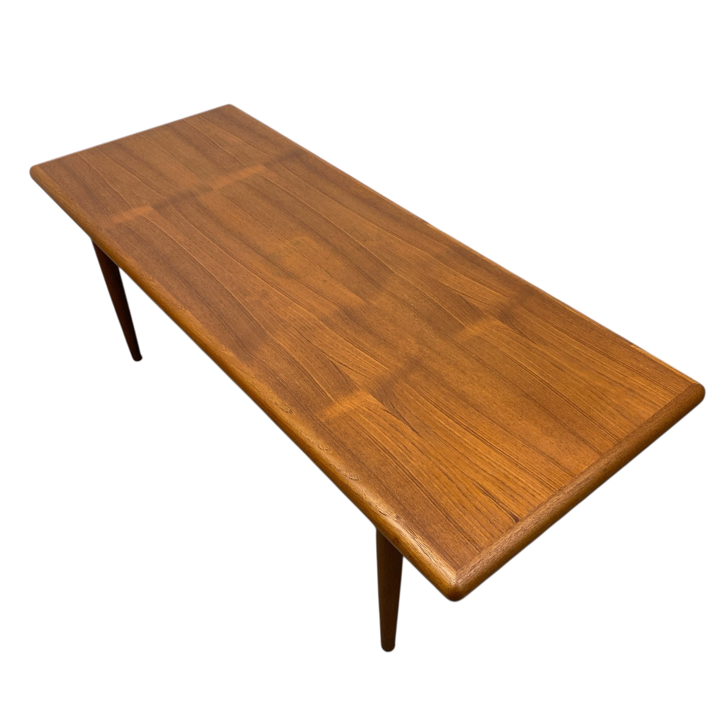 Wooden table with a grainy pattern on a white background