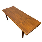 Load image into Gallery viewer, Wooden table with a grainy pattern on a white background
