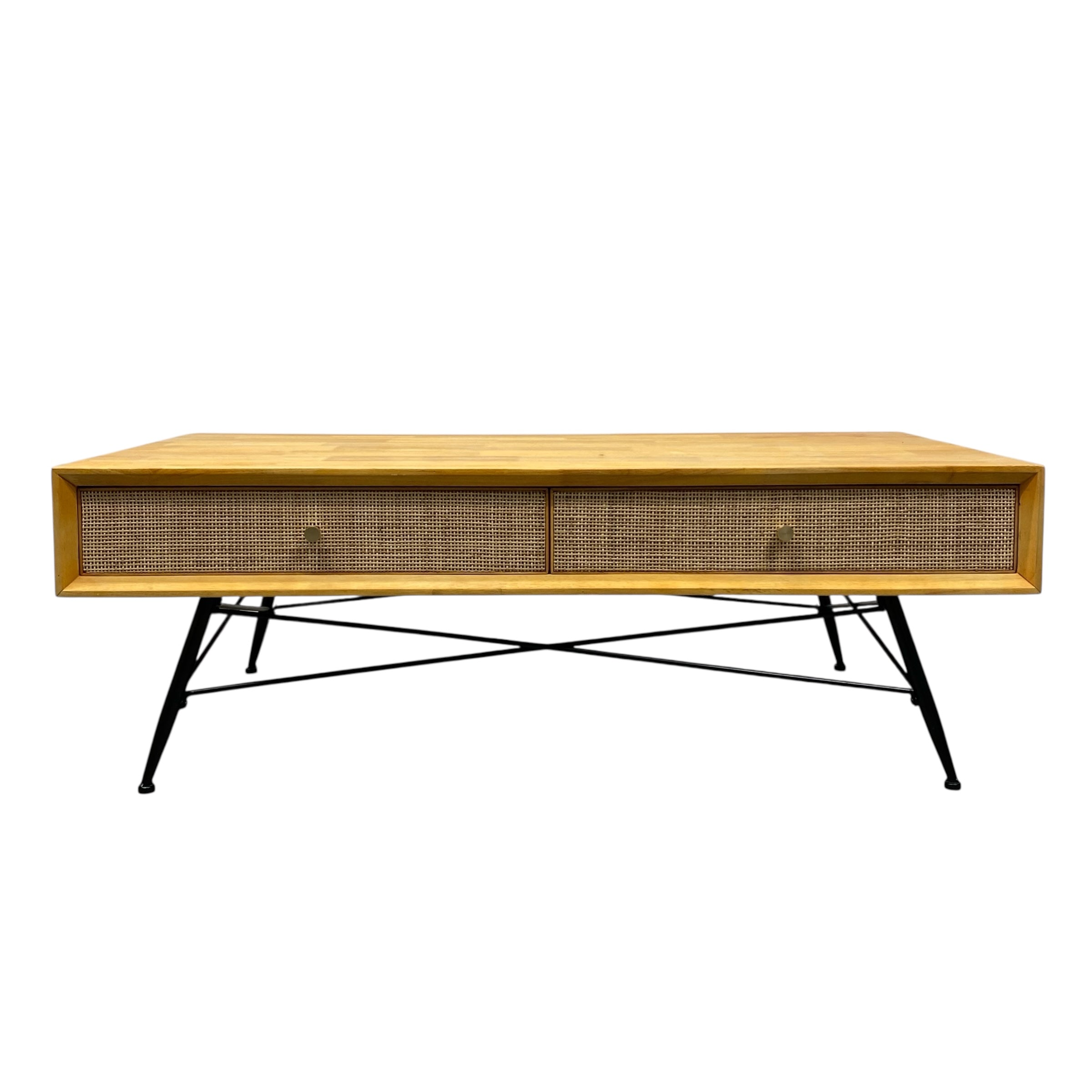 Wooden coffee table with wicker side panels on a white background