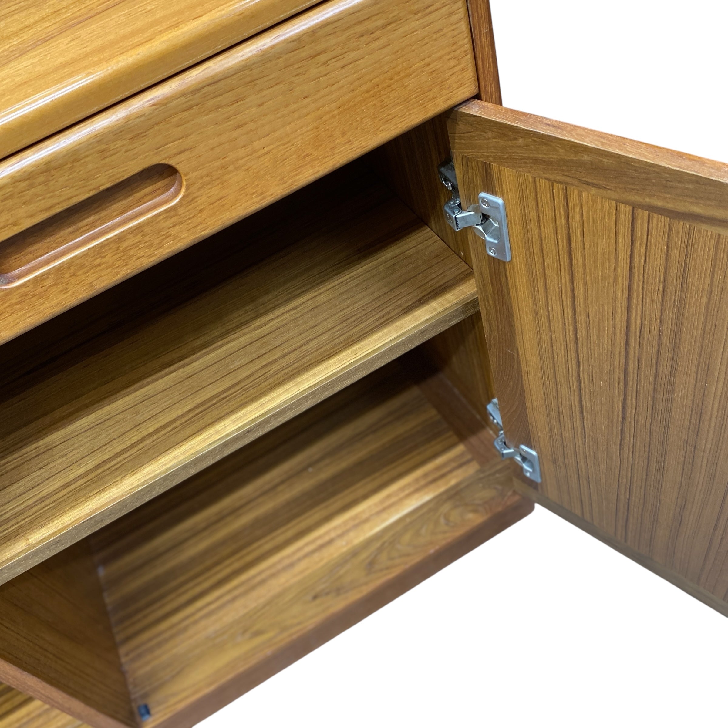 Wooden cabinet with open door showing interior shelves on a white background