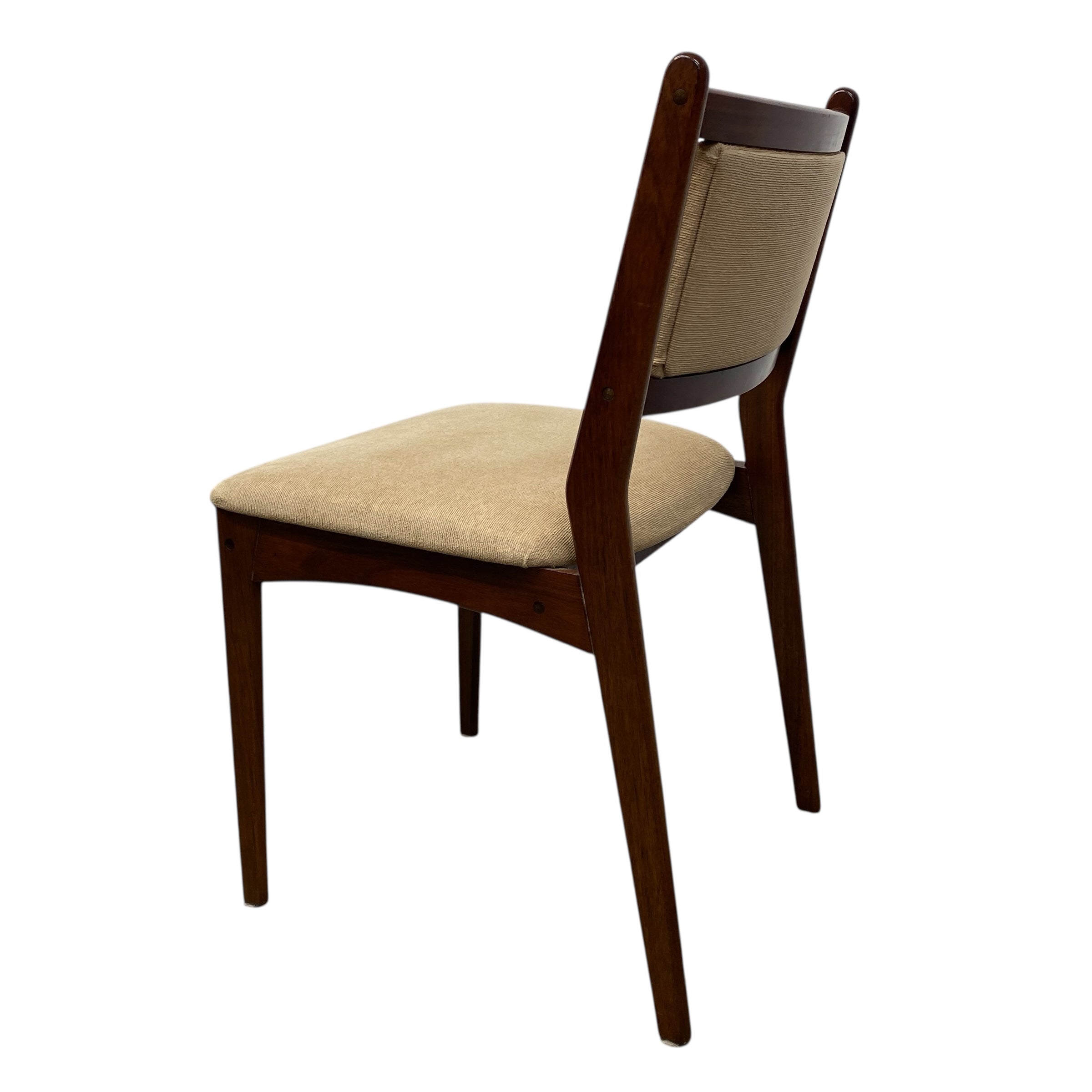 Wooden chair with beige cushioned seat and backrest on a white background