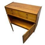 Load image into Gallery viewer, Wooden desk with drawers and an open shelf on a white background
