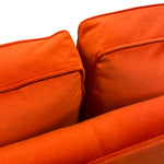 Load image into Gallery viewer, Close-up of an orange sofa with a white background
