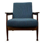 Load image into Gallery viewer, Blue upholstered armchair with wooden frame on a white background
