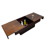 Load image into Gallery viewer, Wooden coffee table with a hidden bar compartment on a white background
