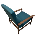 Load image into Gallery viewer, Teal armchair with wooden frame on a white background
