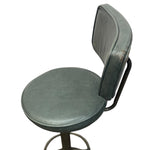 Load image into Gallery viewer, Green metal stool with a cushioned seat and backrest on a white background
