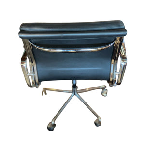 Top profile of desk chair highlighting handle for chair movement