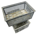 Load image into Gallery viewer, Two gray metal storage baskets stacked on a white background

