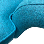 Load image into Gallery viewer, Close-up of a blue cushion with a textured surface on a white background
