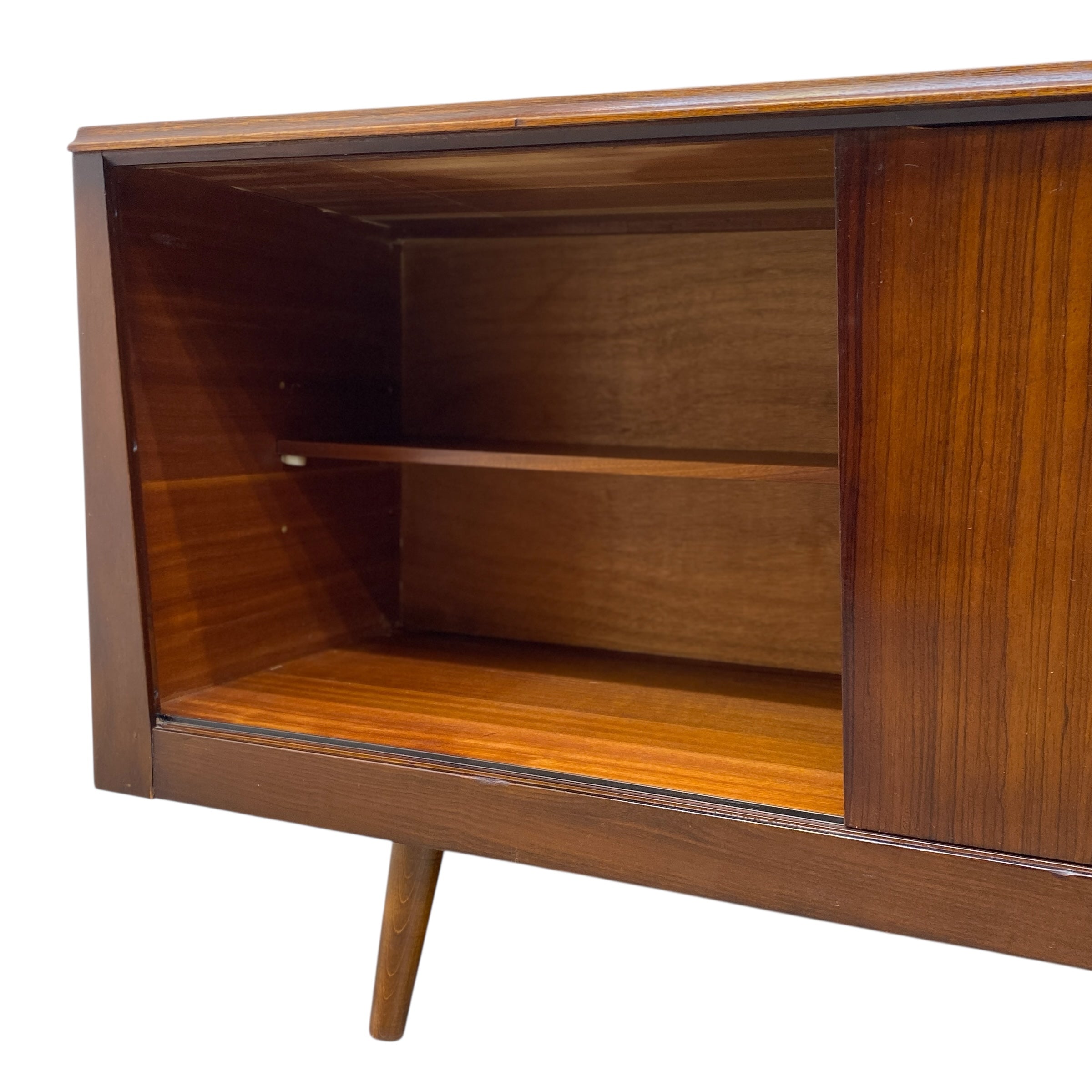 Wooden cabinet with glass panel on a white background