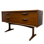 Load image into Gallery viewer, Wooden dresser with four drawers on a white background
