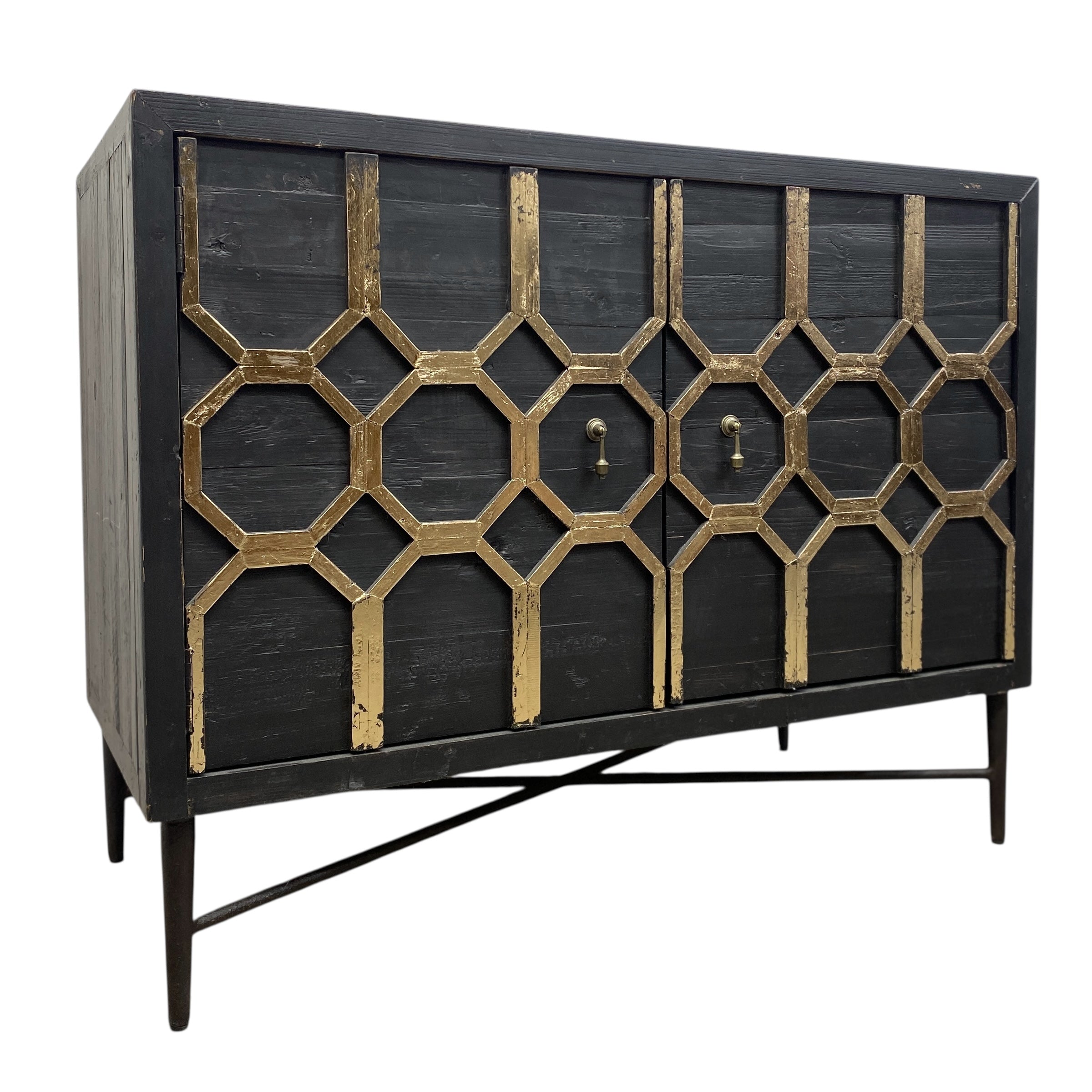 Black cabinet with geometric gold patterns on a white background