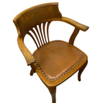 Load image into Gallery viewer, Wooden chair with leather seat on a white background

