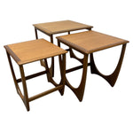 Load image into Gallery viewer, Set of three wooden nesting tables on a white background
