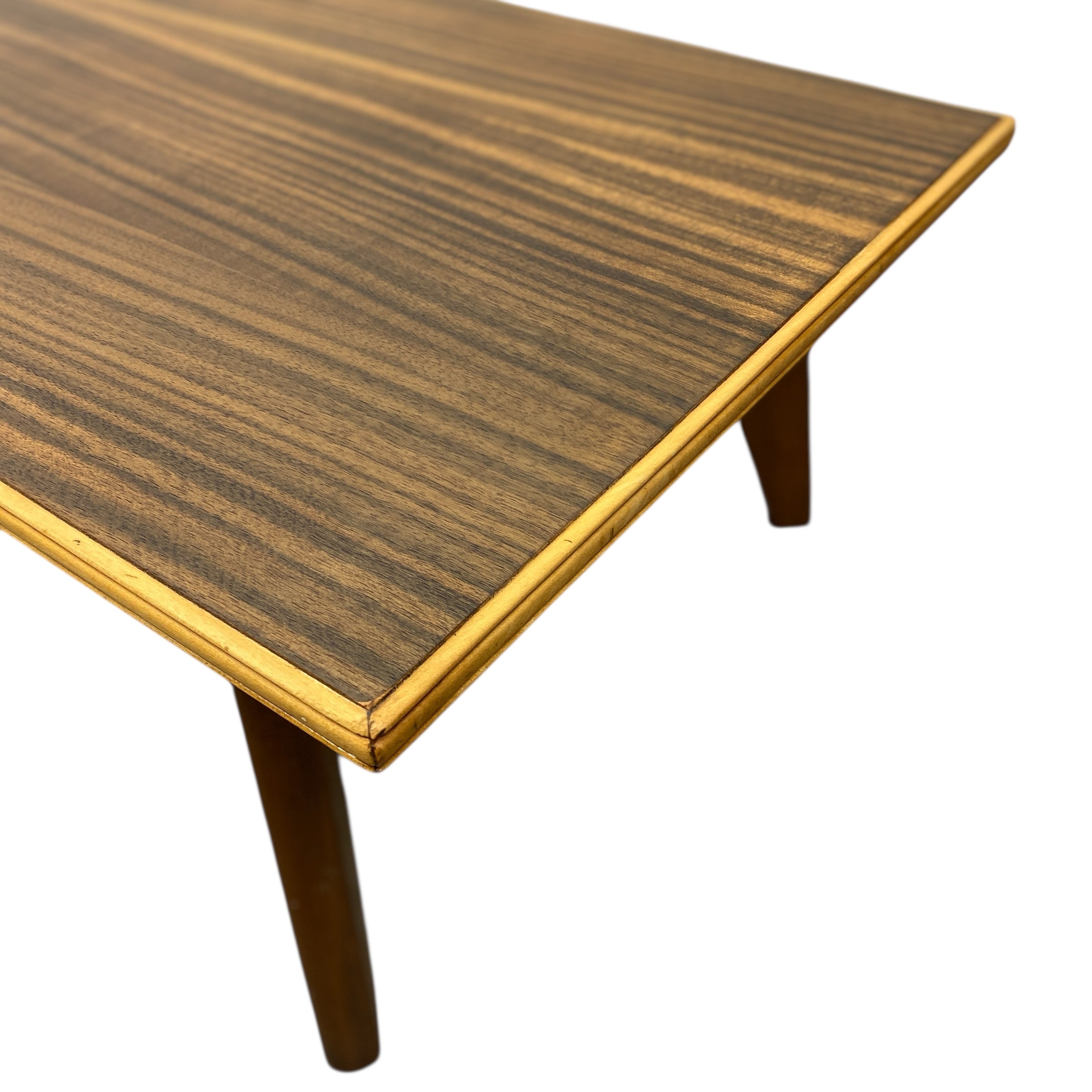 Wooden table with a striped pattern on a white background