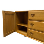 Load image into Gallery viewer, Wooden cabinet with open door and drawers on a white background
