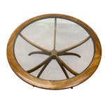 Load image into Gallery viewer, Round wooden table with glass top on a white background
