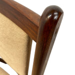 Load image into Gallery viewer, Close-up of a wooden chair with a beige cushion on a white background
