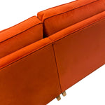 Load image into Gallery viewer, Close-up of an orange sofa with a white background
