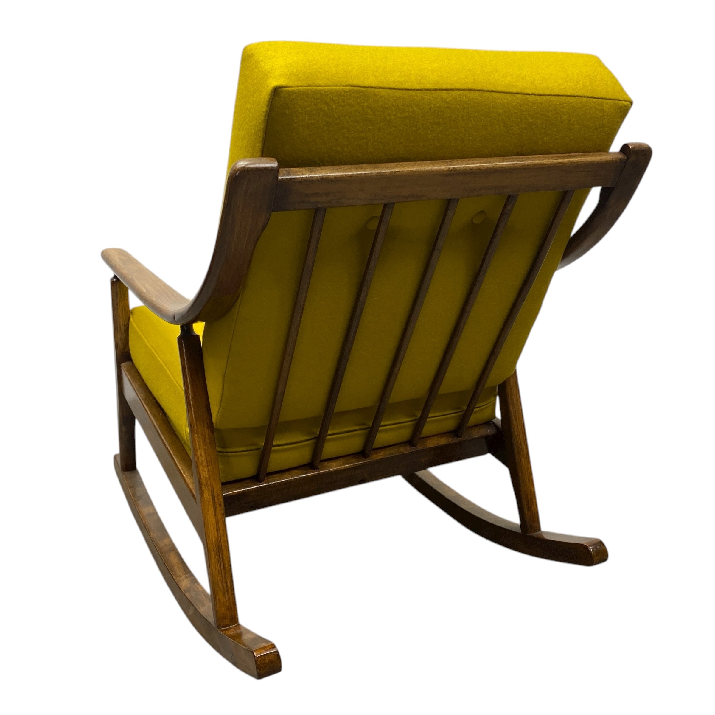 Yellow cushioned rocking chair with wooden frame on a white background