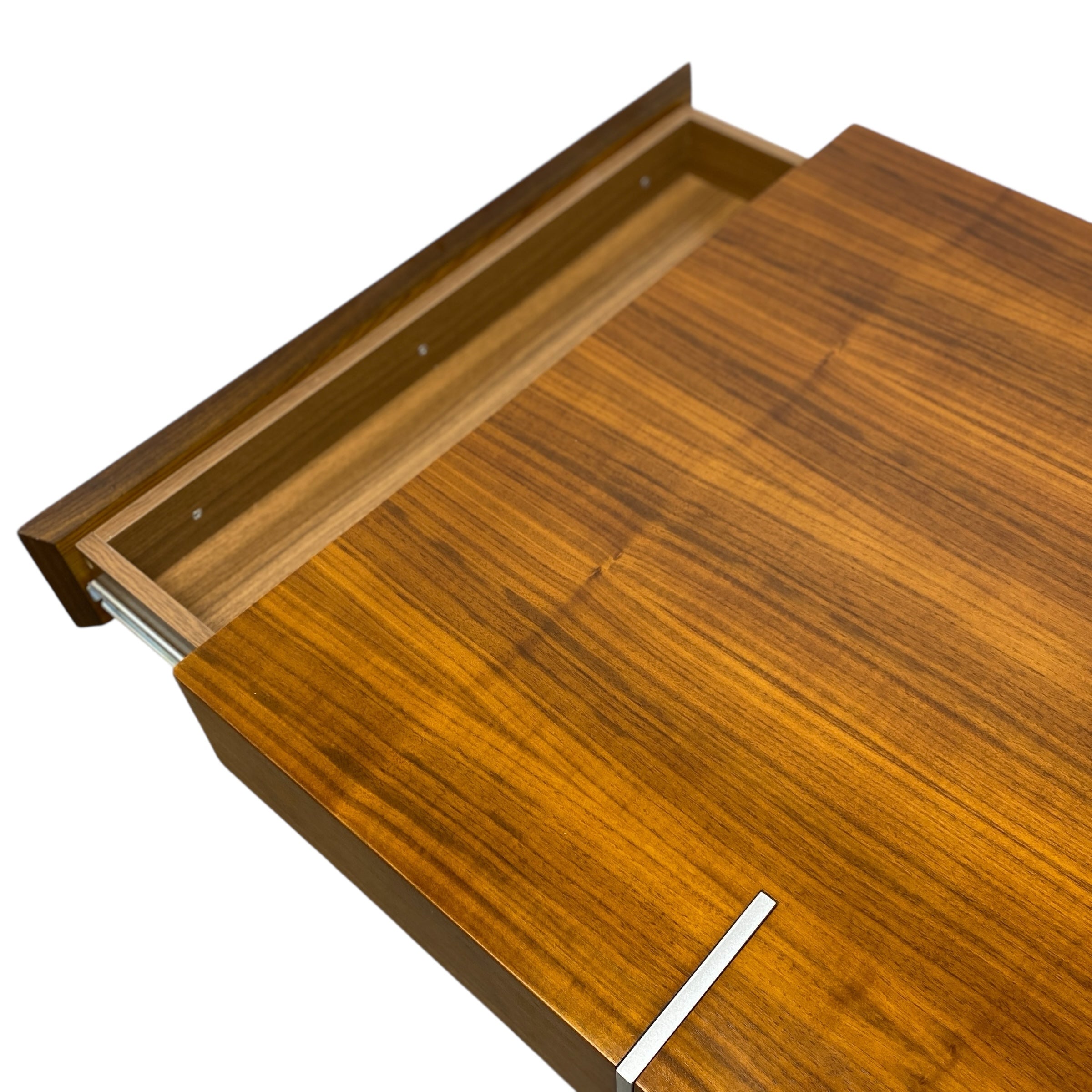 Wooden coffee table with a partially open drawer on a white background