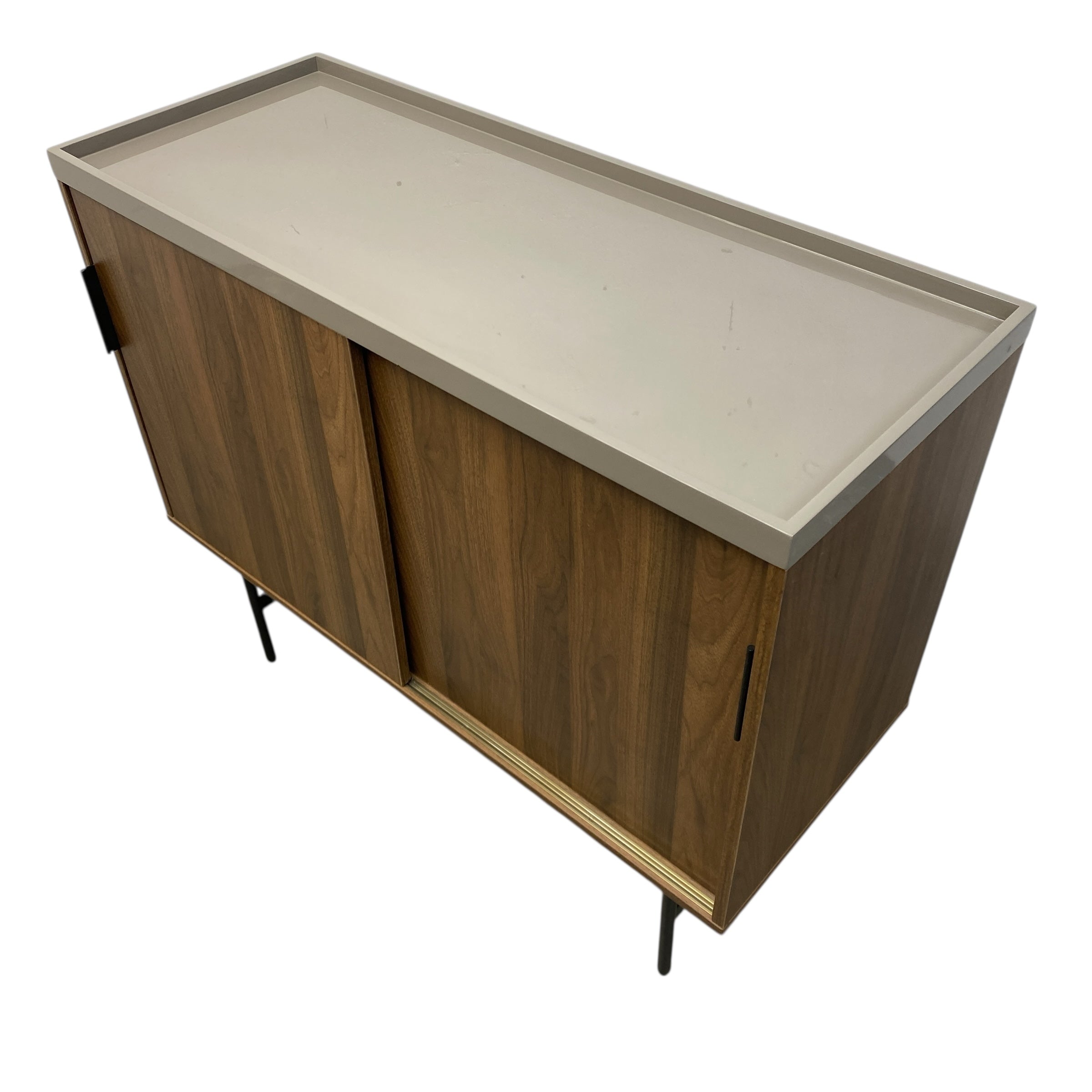 Wooden cabinet with a beige countertop on a white background