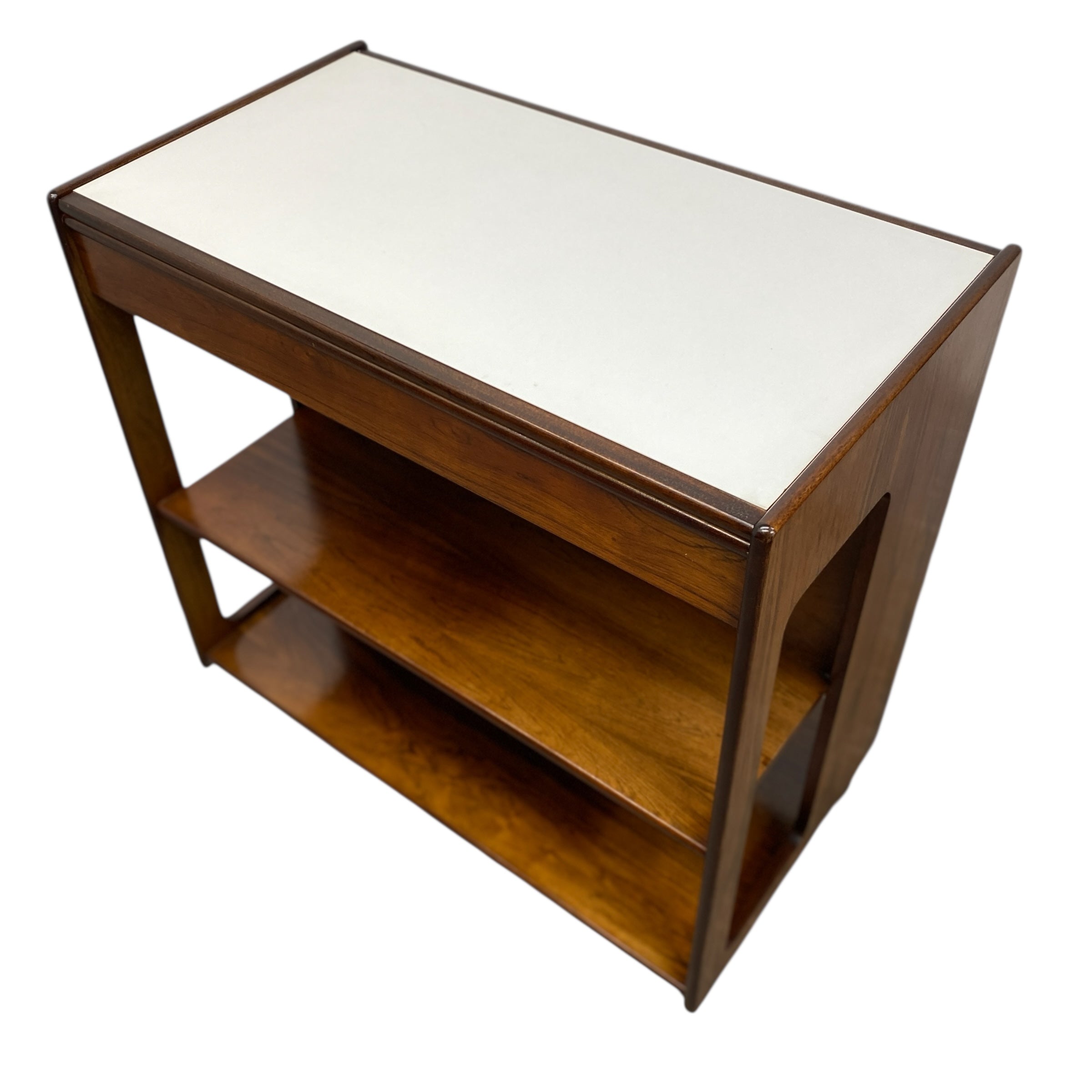 white formica top on a rosewood drinks trolley