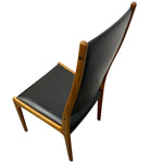 Load image into Gallery viewer, Chair with black leather seat and backrest on a white background
