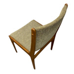 Load image into Gallery viewer, Chair with woven backrest and wooden frame on a white background
