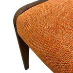 Load image into Gallery viewer, G plan Close-up of an orange textured chair with a wooden armrest on a white background
