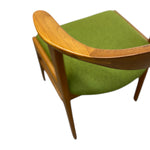 Load image into Gallery viewer, Green chair with wooden frame on a white background
